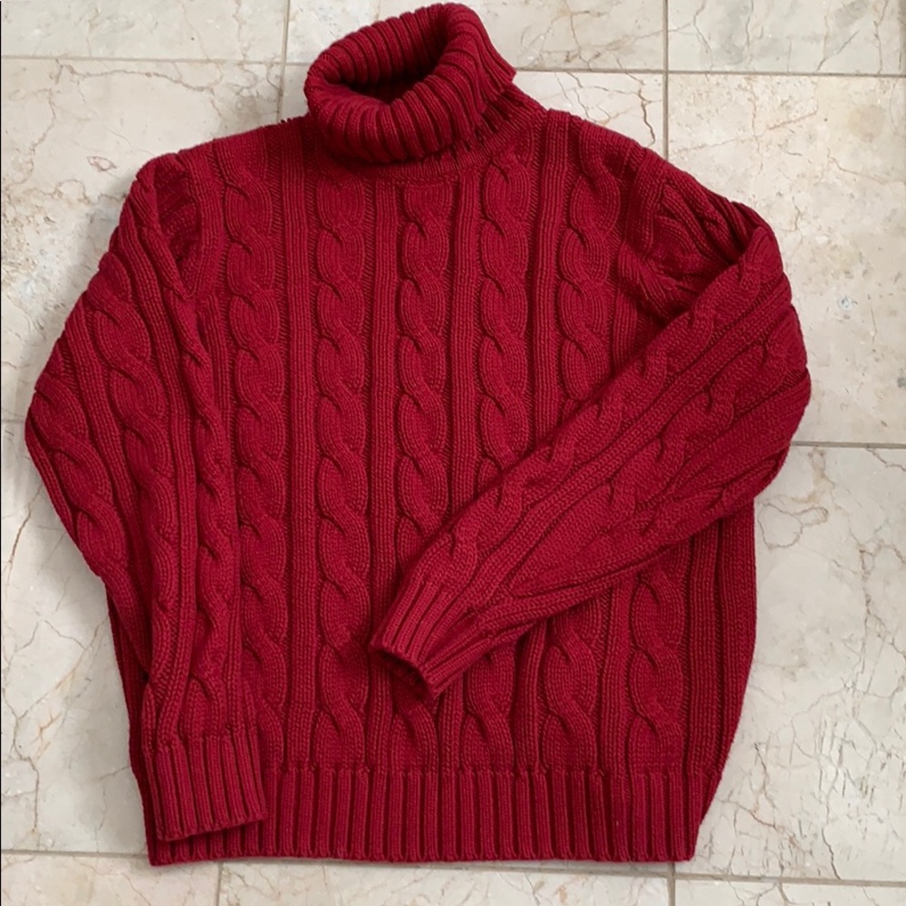 Cable knit turtle neck sweater.